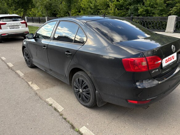 2012 Volkswagen Jetta VI, чёрный - вид 4