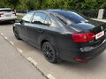 2012 Volkswagen Jetta VI, чёрный - вид 4