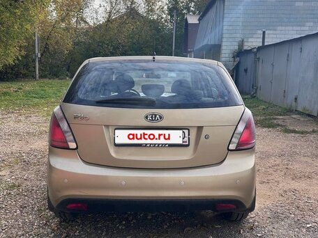 2011 Kia Rio II Рестайлинг, бежевый, 500000 рублей, вид 4