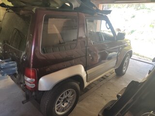 1995 Mitsubishi Pajero Junior, красный, 325000 рублей, вид 3
