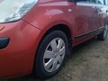 2007 Nissan Note I, красный, 395000 рублей - вид 4