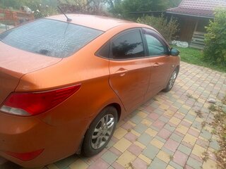 2015 Hyundai Solaris I Рестайлинг, оранжевый, 650000 рублей, вид 1