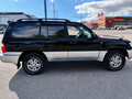 1999 Lexus LX 470 II, чёрный - вид 2