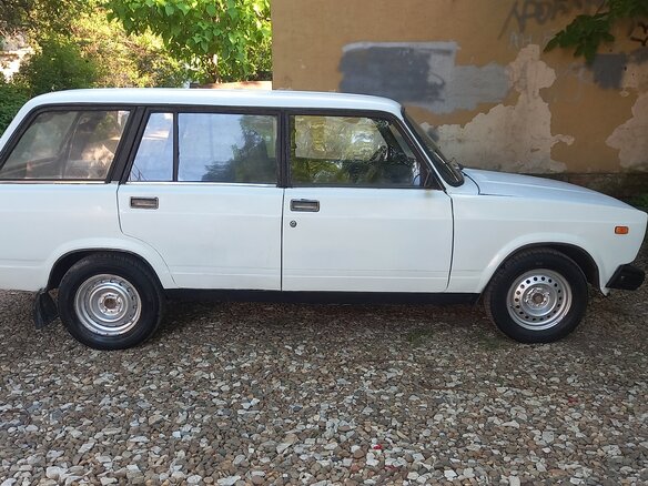 2002 Lada (ВАЗ) 2104 4-speed, белый - вид 1