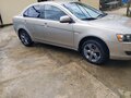2008 Mitsubishi Lancer X, бежевый, 750000 рублей - вид 1