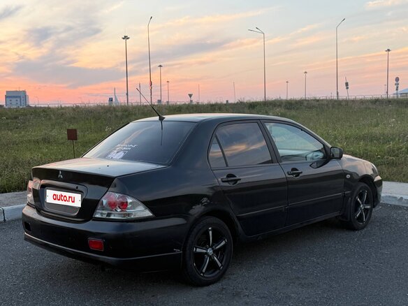 2006 Mitsubishi Lancer IX, чёрный, 265000 рублей - вид 1