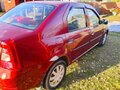 2010 Renault Logan I Рестайлинг, красный, 330000 рублей - вид 2