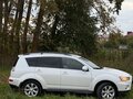 2011 Mitsubishi Outlander II Рестайлинг, белый, 1300000 рублей - вид 1
