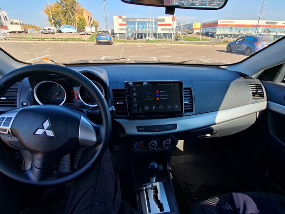 2010 Mitsubishi Lancer X, чёрный, 629000 рублей - вид 9