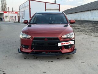 2008 Mitsubishi Lancer X, красный, 750000 рублей, вид 2