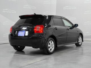 2003 Toyota Corolla Runx IX (E120, E130), чёрный, 680000 рублей, вид 5