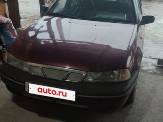 2006 Daewoo Nexia I, пурпурный, 100000 рублей, вид 1