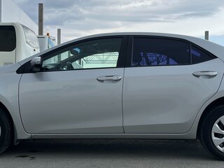 2013 Toyota Corolla XI (E160, E170, E180), серебристый, 1340000 рублей, вид 3