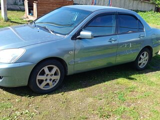 2006 Mitsubishi Lancer IX Рестайлинг, голубой, 430000 рублей, вид 1