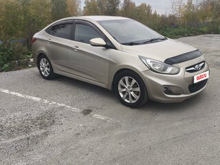 2011 Hyundai Solaris I, бежевый, 590000 рублей, вид 3
