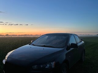 2010 Mitsubishi Lancer X, чёрный, 650000 рублей, вид 1