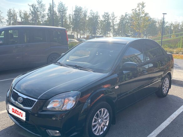 2011 Kia Rio II Рестайлинг, чёрный, 420000 рублей