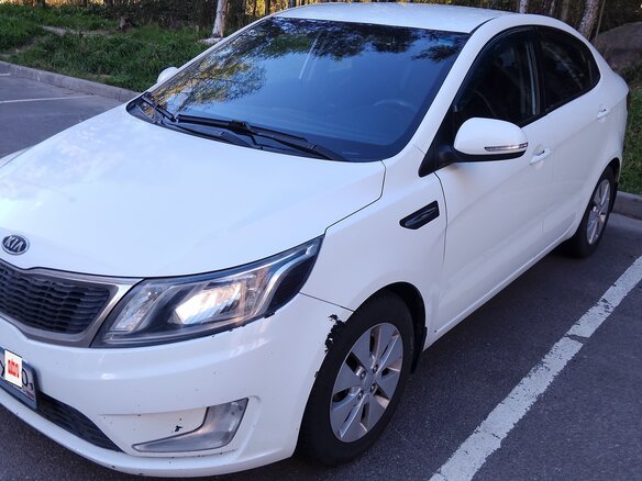 2012 Kia Rio 4-speed III, белый - вид 1