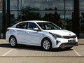 2021 Kia Rio IV Рестайлинг, белый - вид 2