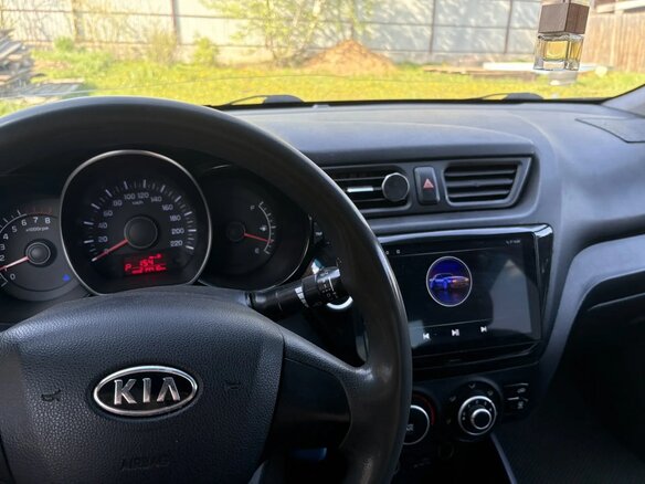 2012 Kia Rio 4-speed III, голубой, 750000 рублей - вид 4