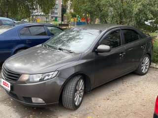 2010 Kia Cerato 6-speed II, коричневый, 720000 рублей, вид 1