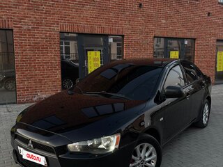 2010 Mitsubishi Lancer X, чёрный, 700000 рублей, вид 1