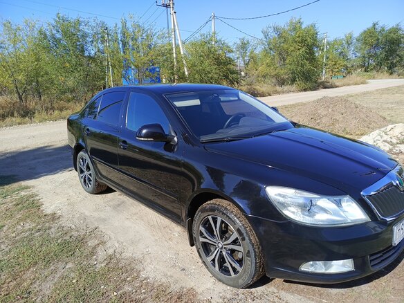 2012 Skoda Octavia II (A5) Рестайлинг, чёрный, 720000 рублей