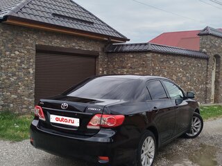 2010 Toyota Corolla X (E140, E150) Рестайлинг, чёрный, 859000 рублей, вид 3