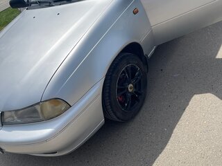 2001 Daewoo Nexia I, серебристый, 180000 рублей, вид 1