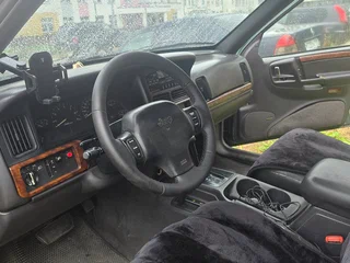 1997 Jeep Grand Cherokee I (ZJ) Рестайлинг, зелёный, 400000 рублей, вид 4