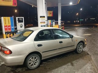 1995 Mazda 323 V (BA), бежевый, 300000 рублей, вид 4