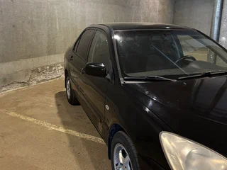 2006 Mitsubishi Lancer IX Рестайлинг, чёрный, 374990 рублей, вид 4