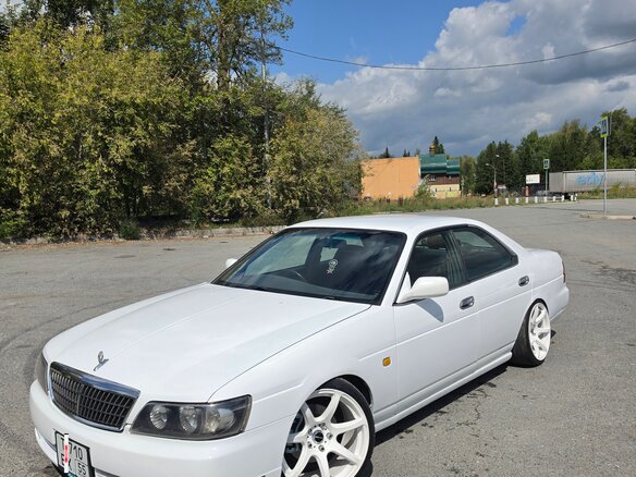 1998 Nissan Laurel VIII (C35), белый, 750000 рублей - вид 1