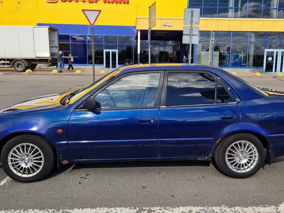 1999 Toyota Corolla VIII (E110), синий - вид 1