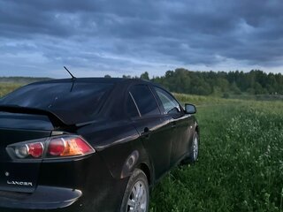 2010 Mitsubishi Lancer X, чёрный, 650000 рублей, вид 4