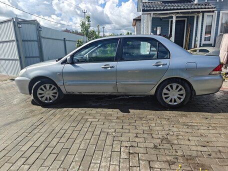 2009 Mitsubishi Lancer Classic IX Рестайлинг, серебристый, 265000 рублей, вид 3