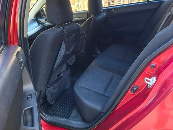 2008 Mitsubishi Lancer X, красный, 790000 рублей - вид 16