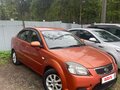 2011 Kia Rio II Рестайлинг, оранжевый, 490000 рублей - вид 2