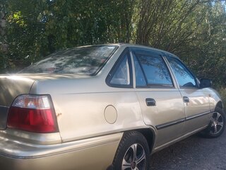 2004 Daewoo Nexia I, золотистый, 99000 рублей, вид 3