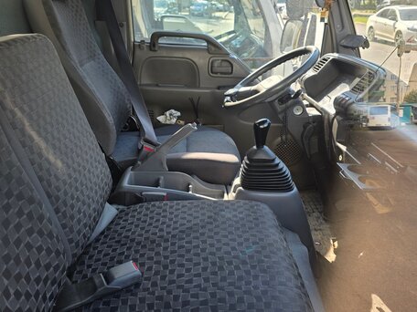 2009 Isuzu Elf (N-series), белый, 1340000 рублей, вид 3