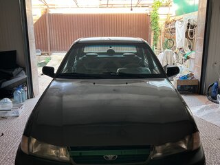 2002 Daewoo Nexia I, коричневый, 700000 рублей, вид 1