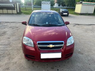 2011 Chevrolet Aveo I Рестайлинг, красный, 550000 рублей, вид 1