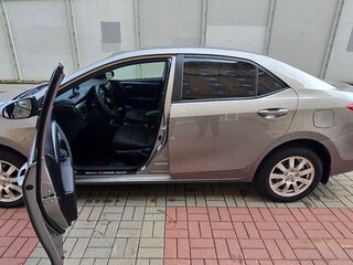 2014 Toyota Corolla XI (E160, E170, E180), золотистый, 1250000 рублей, вид 3