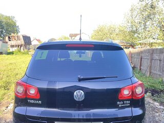 2011 Volkswagen Tiguan I, чёрный, 1245000 рублей, вид 3