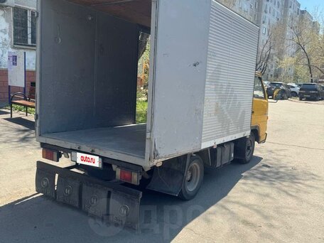 1990 Isuzu Elf (N-series), жёлтый, 700000 рублей, вид 4
