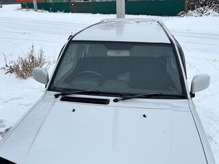 1999 Mitsubishi Pajero iO, белый, 310000 рублей, вид 3