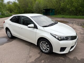 2014 Toyota Corolla XI (E160, E170, E180), белый, 1400000 рублей, вид 2