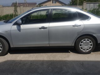 2014 Nissan Almera III (G15), серебристый, 650000 рублей, вид 3