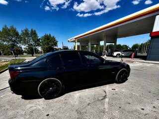 2009 BMW 7 серии 730d V (F01/F02/F04), чёрный, 2200000 рублей, вид 4