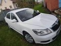 2011 Skoda Octavia II (A5) Рестайлинг, белый - вид 2
